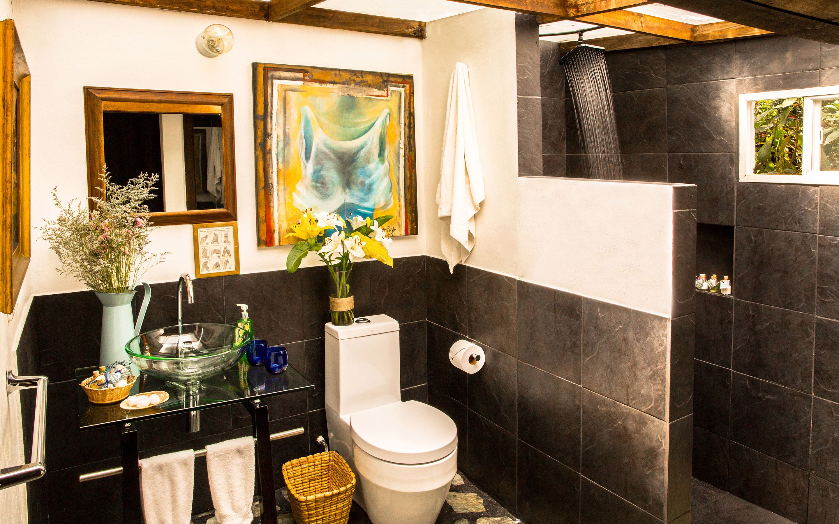 deluxe room | bathroom | shower, rainfall showerhead, free toiletries, hair dryer