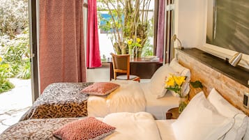 Habitación Deluxe | Sábanas de algodón egipcio, ropa de cama de alta calidad y edredón