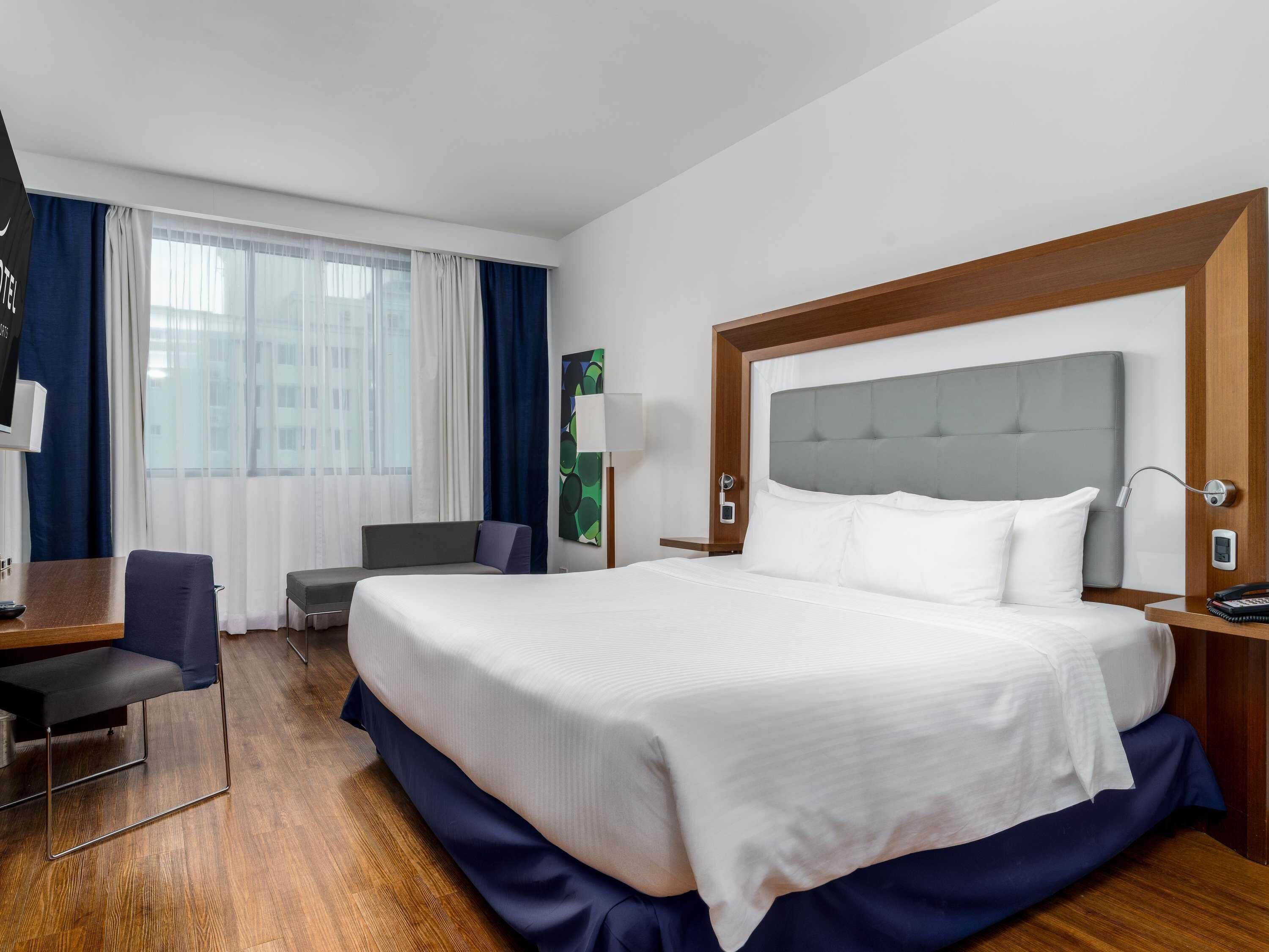 Habitación superior, 1 cama de matrimonio grande | 1 dormitorio y ropa de cama de alta calidad