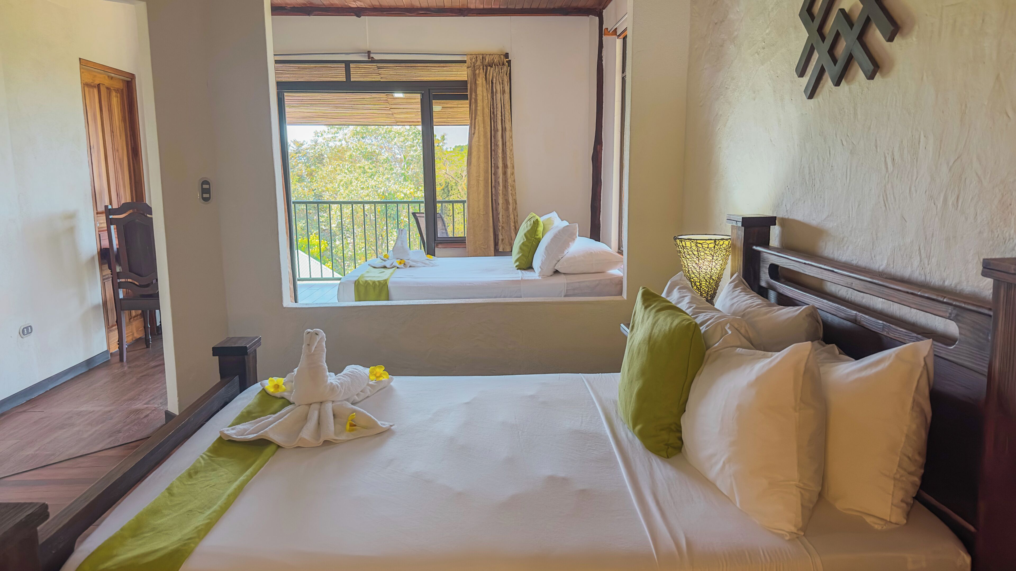 deluxe premium with partial ocean view | frette italian sheets, premium bedding, in-room safe, iron/ironing board