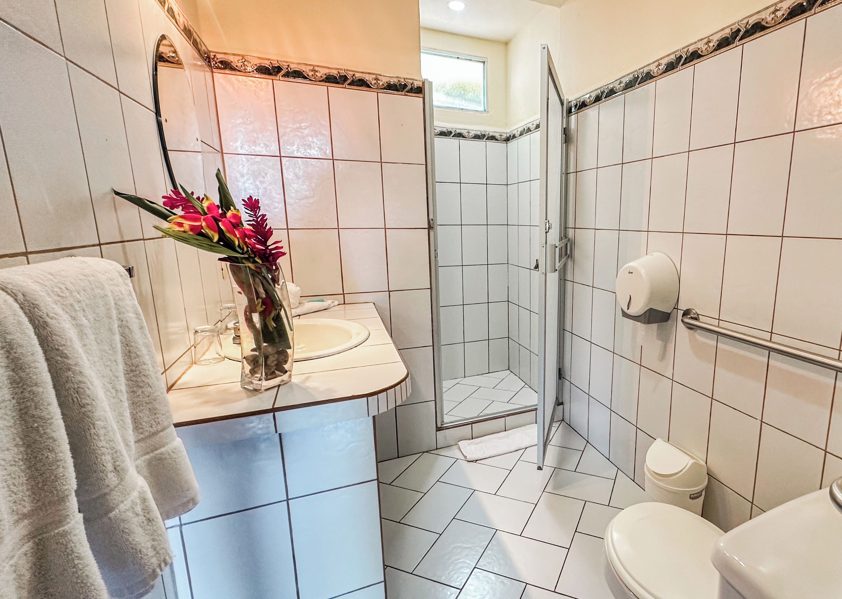 superior garden view | bathroom | shower, free toiletries, hair dryer, towels