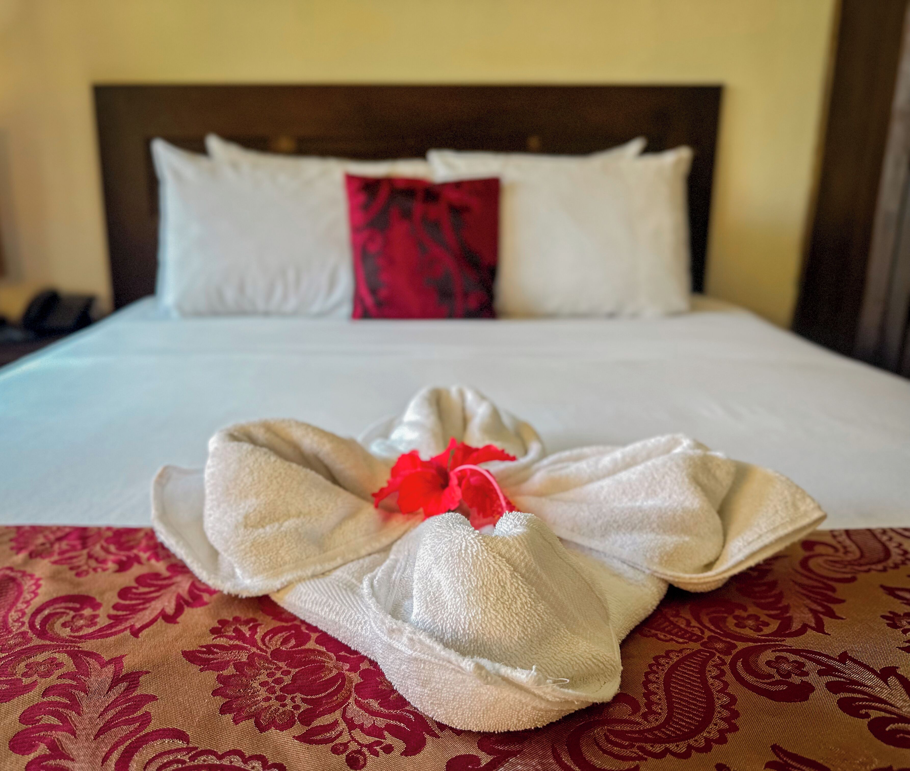 standard garden view | frette italian sheets, premium bedding, in-room safe, iron/ironing board