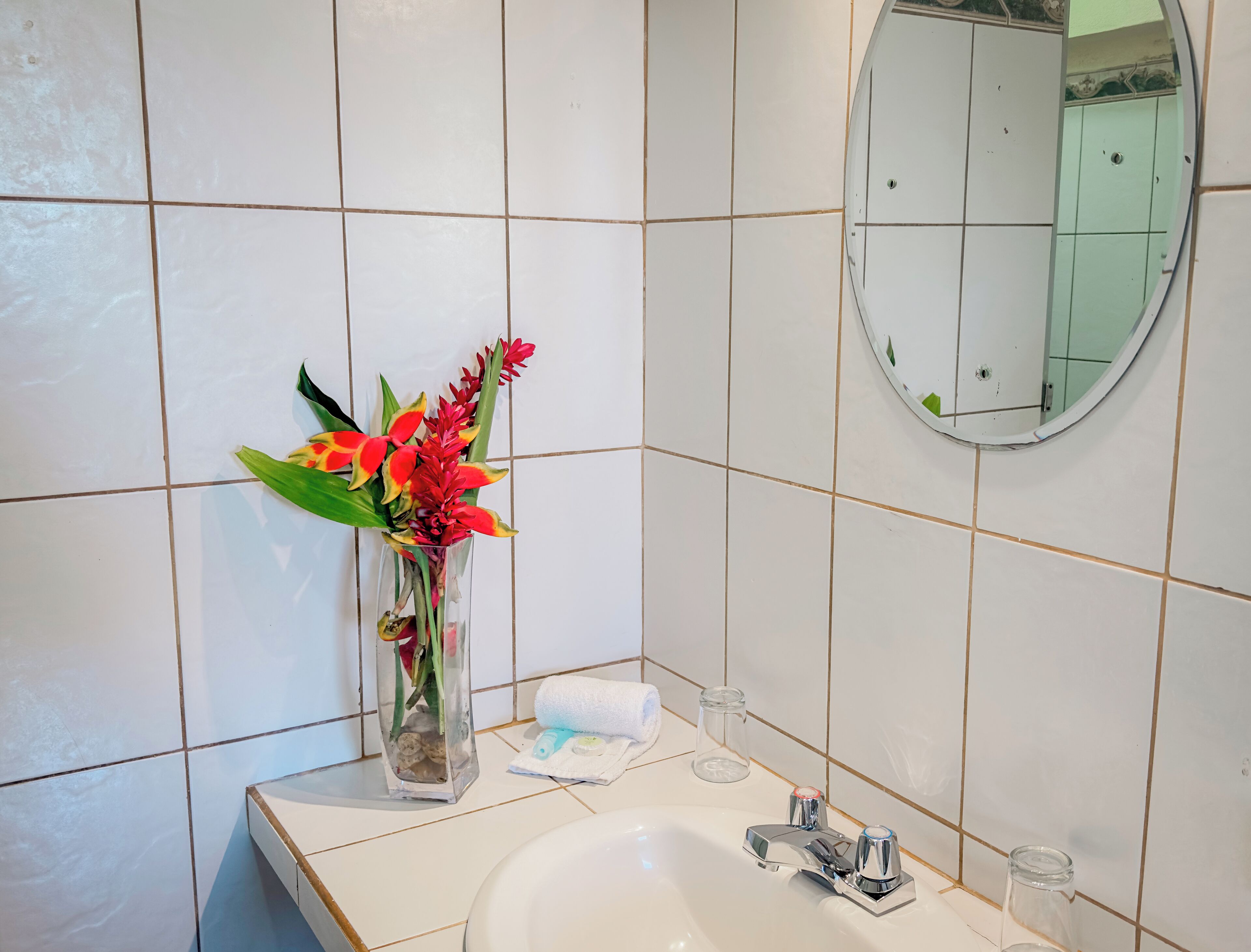 standard garden view | bathroom | shower, free toiletries, hair dryer, towels
