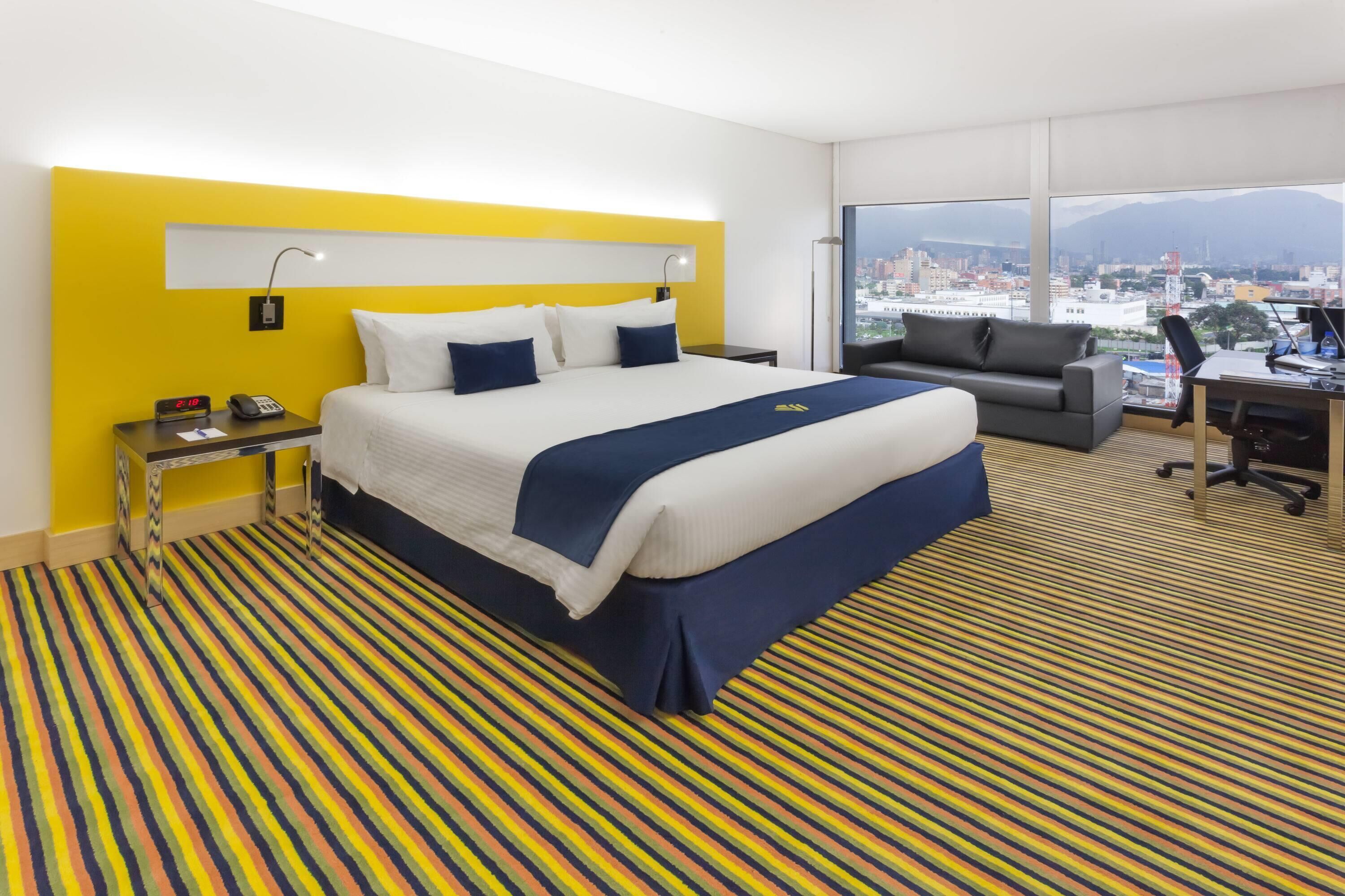 Premium bedding, down duvets, in-room safe, desk