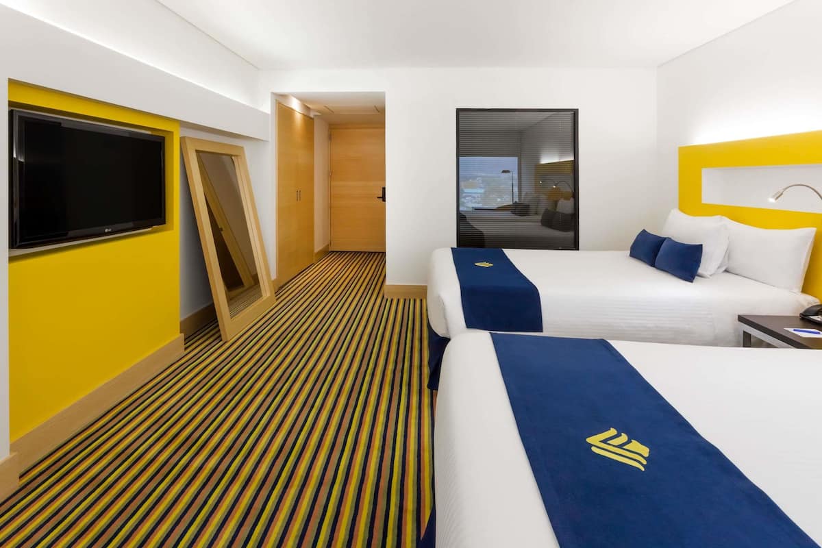 Habitación ejecutiva, 2 camas matrimoniales | Ropa de cama de alta calidad y edredón
