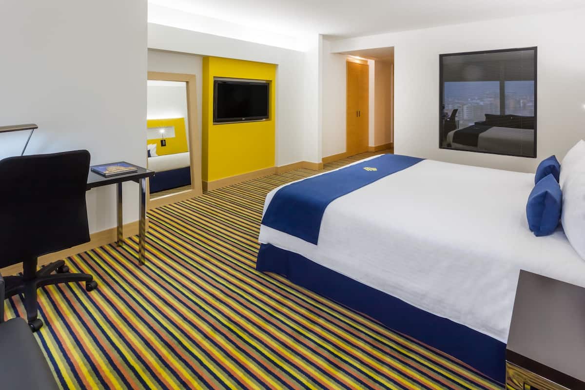 Habitación ejecutiva, 1 cama King size | Ropa de cama de alta calidad y edredón
