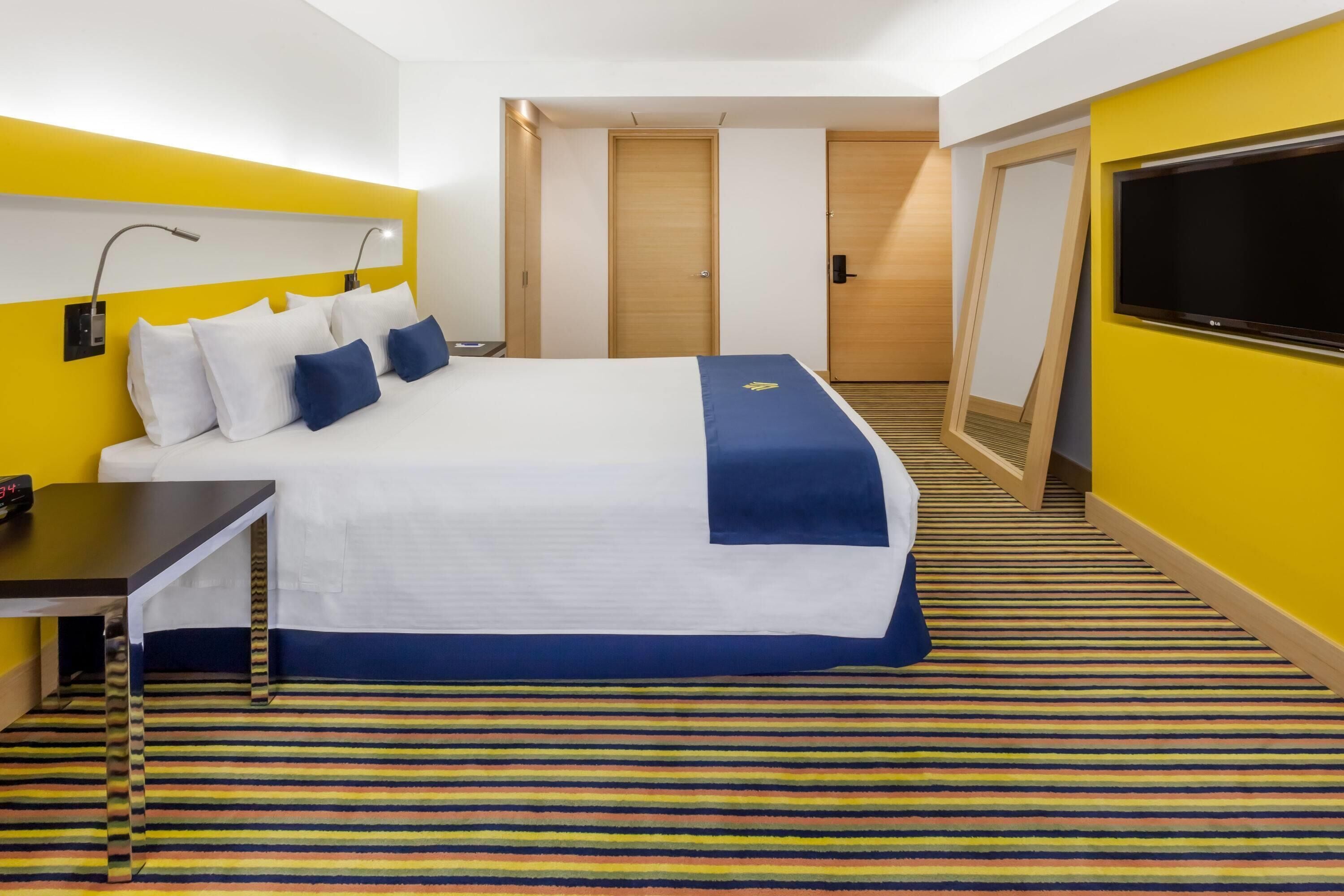 Premium bedding, down duvets, in-room safe, desk