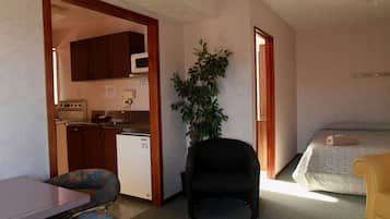 Apartment, 1 Bedroom | Living area | TV
