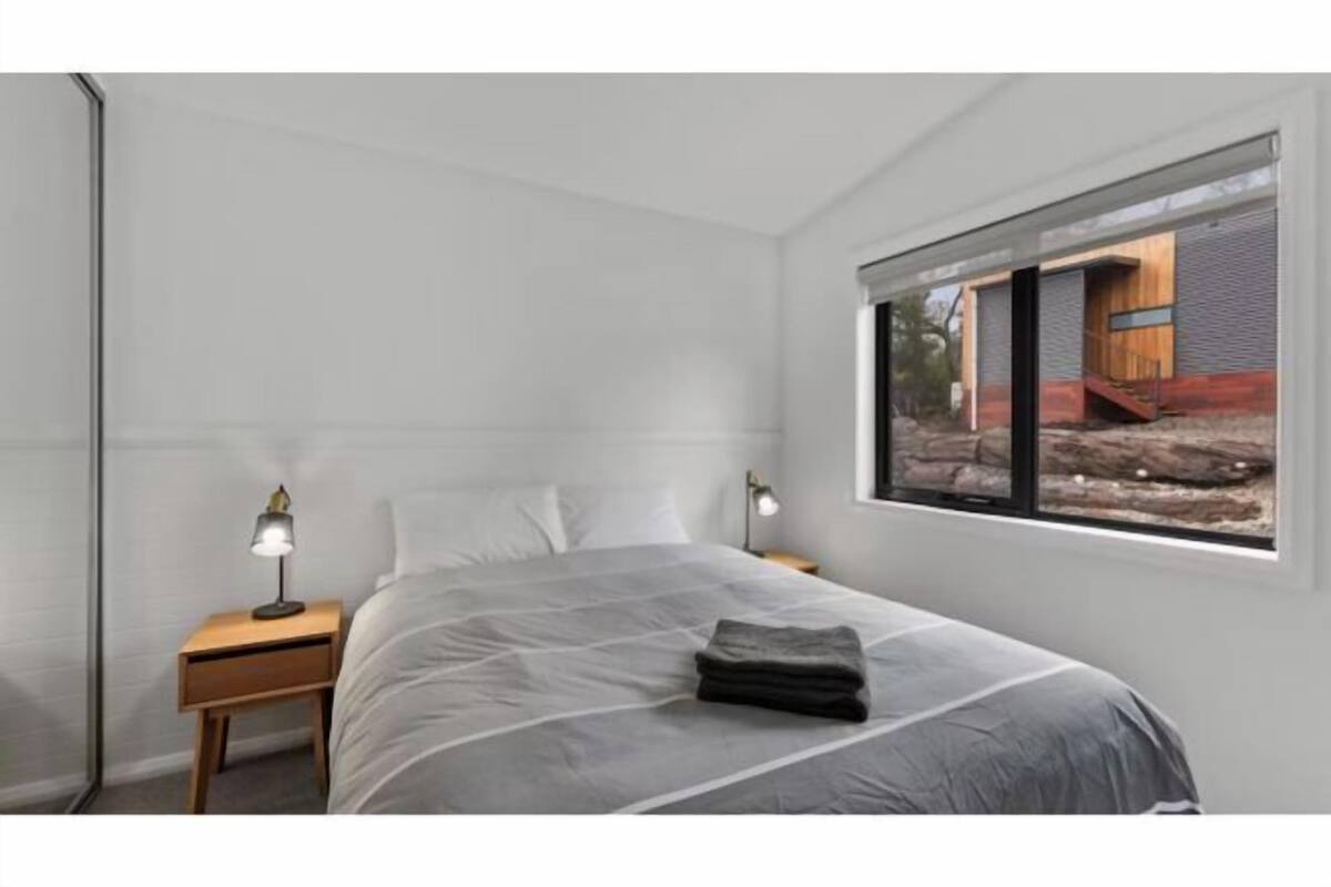 1 bedroom, blackout drapes, bed sheets