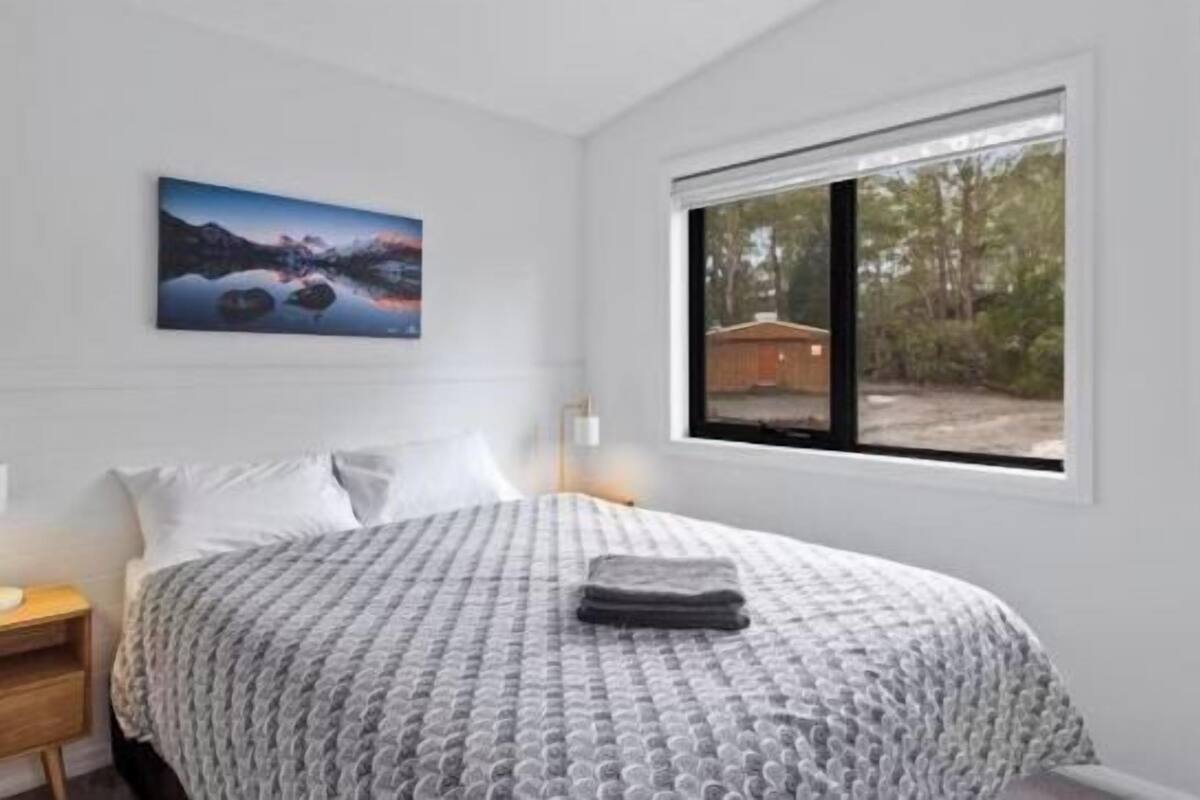 1 bedroom, blackout drapes, bed sheets