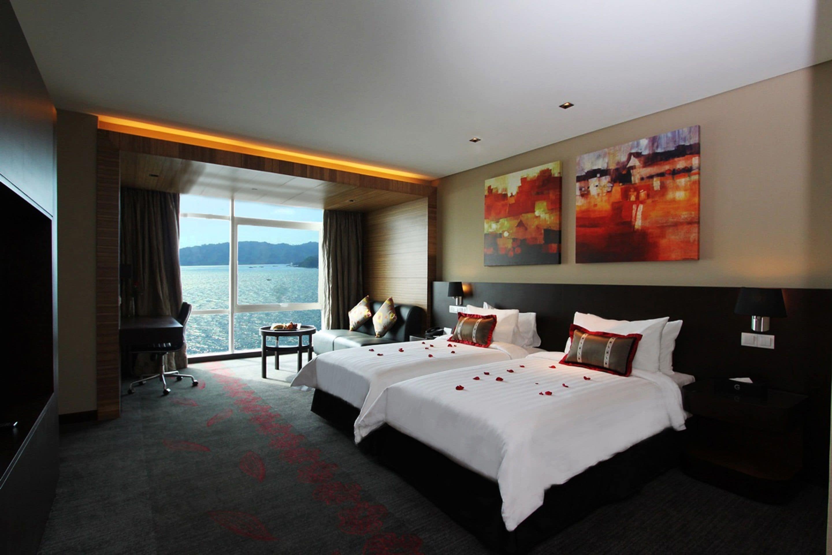 Deluxe Room, Sea View | In-room safe, desk, laptop workspace, blackout drapes