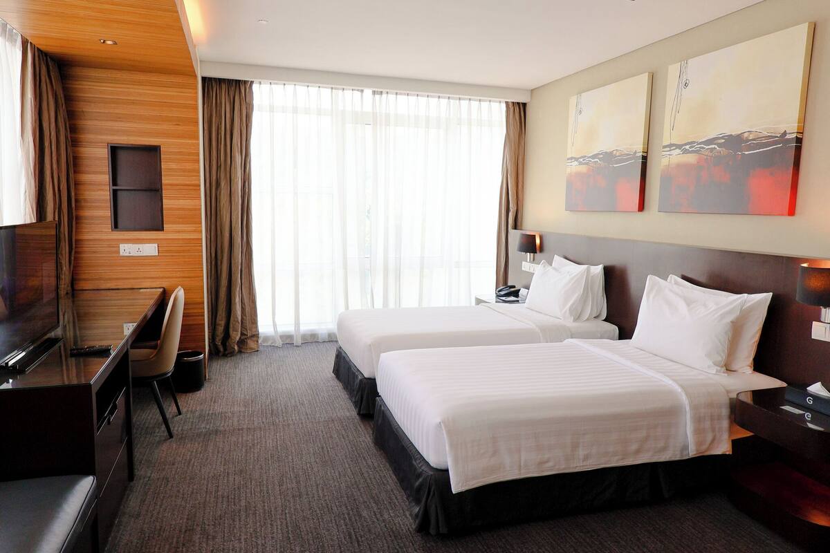 Deluxe Room, 2 Twin Beds | In-room safe, desk, laptop workspace, blackout drapes
