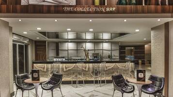 2 bars/lounges, poolside bar, beach bar