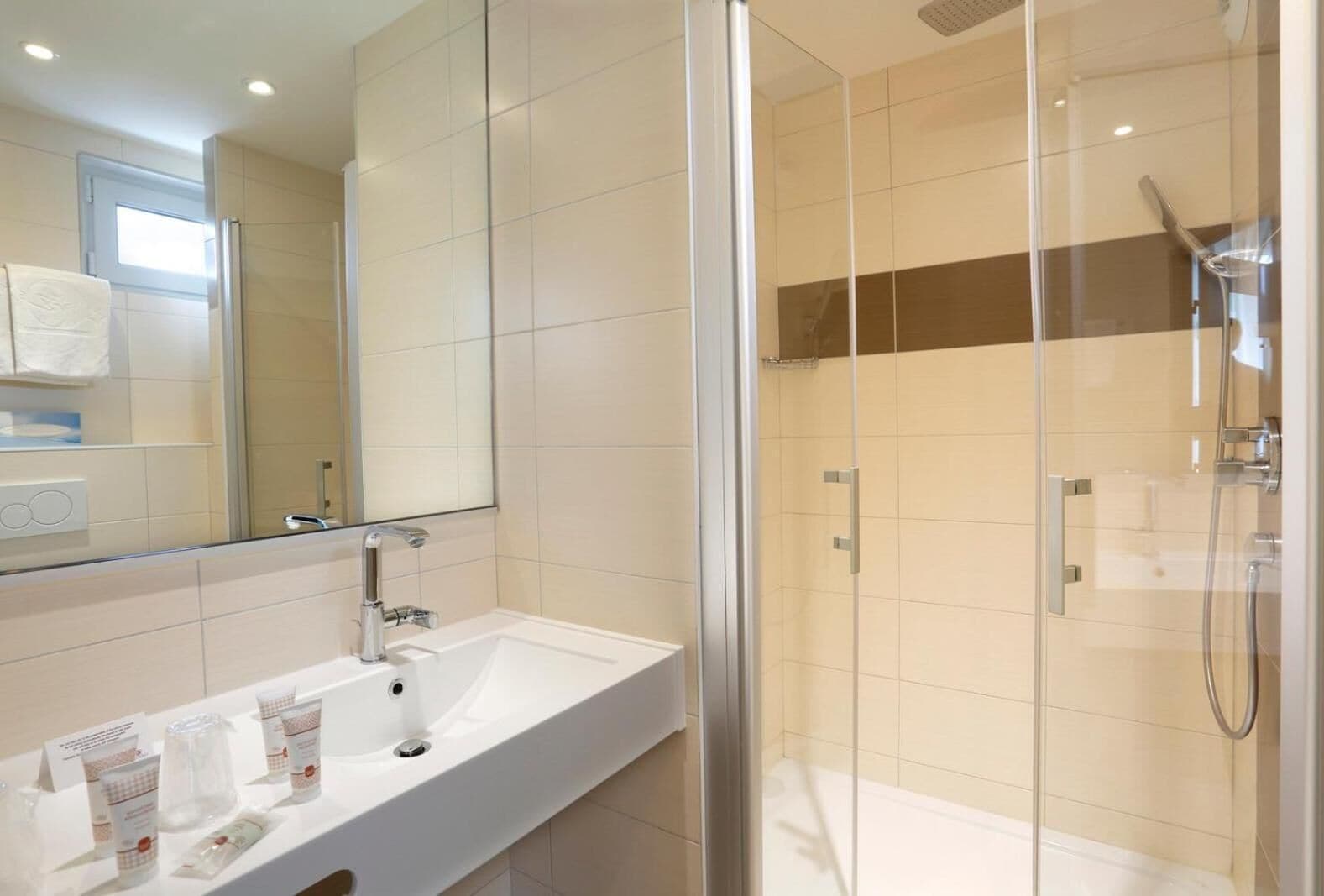 shower, free toiletries, hair dryer, towels