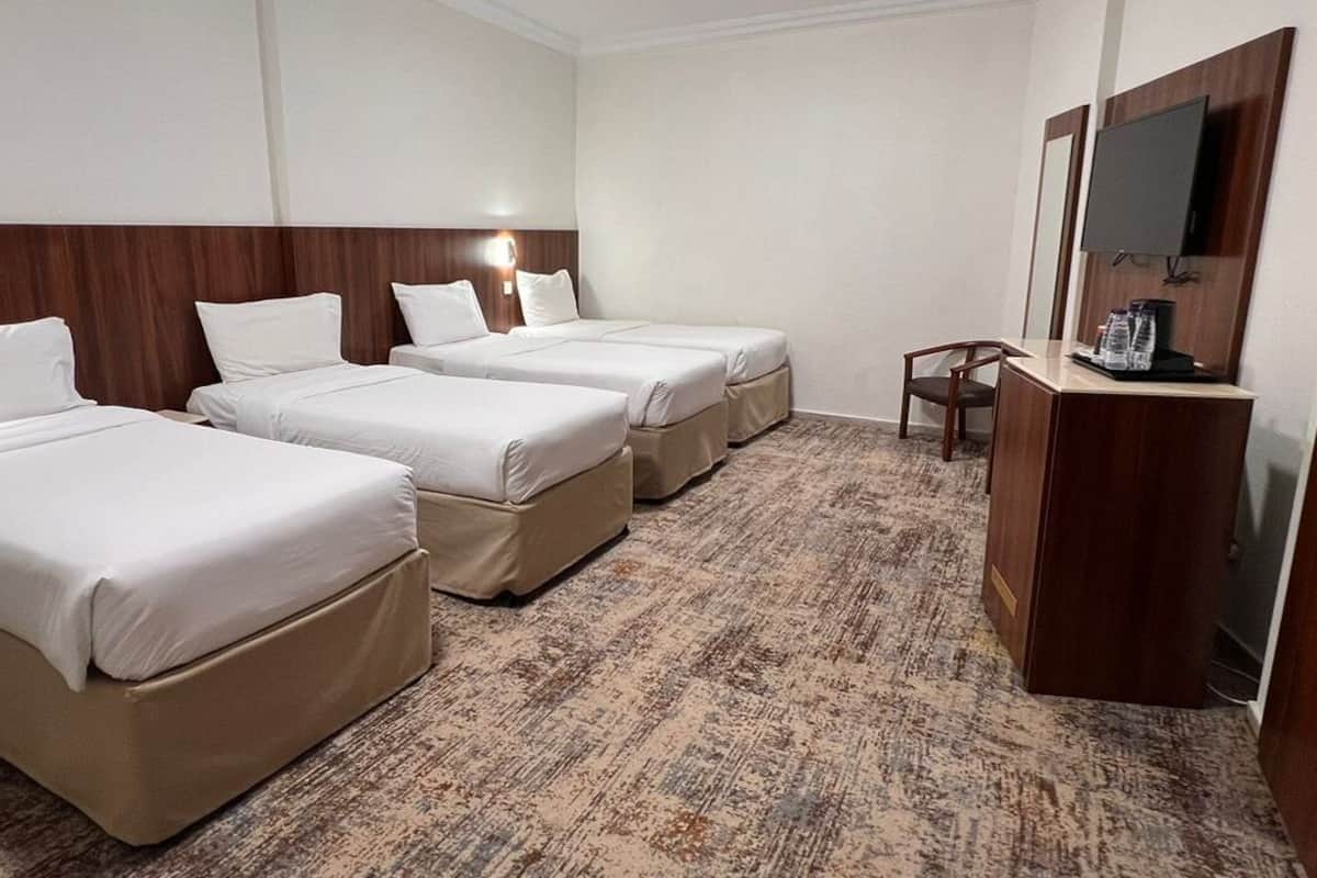 Quadruple Room | Minibar, in-room safe, desk, free WiFi