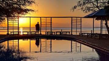 Outdoor pool, free pool cabanas, pool umbrellas