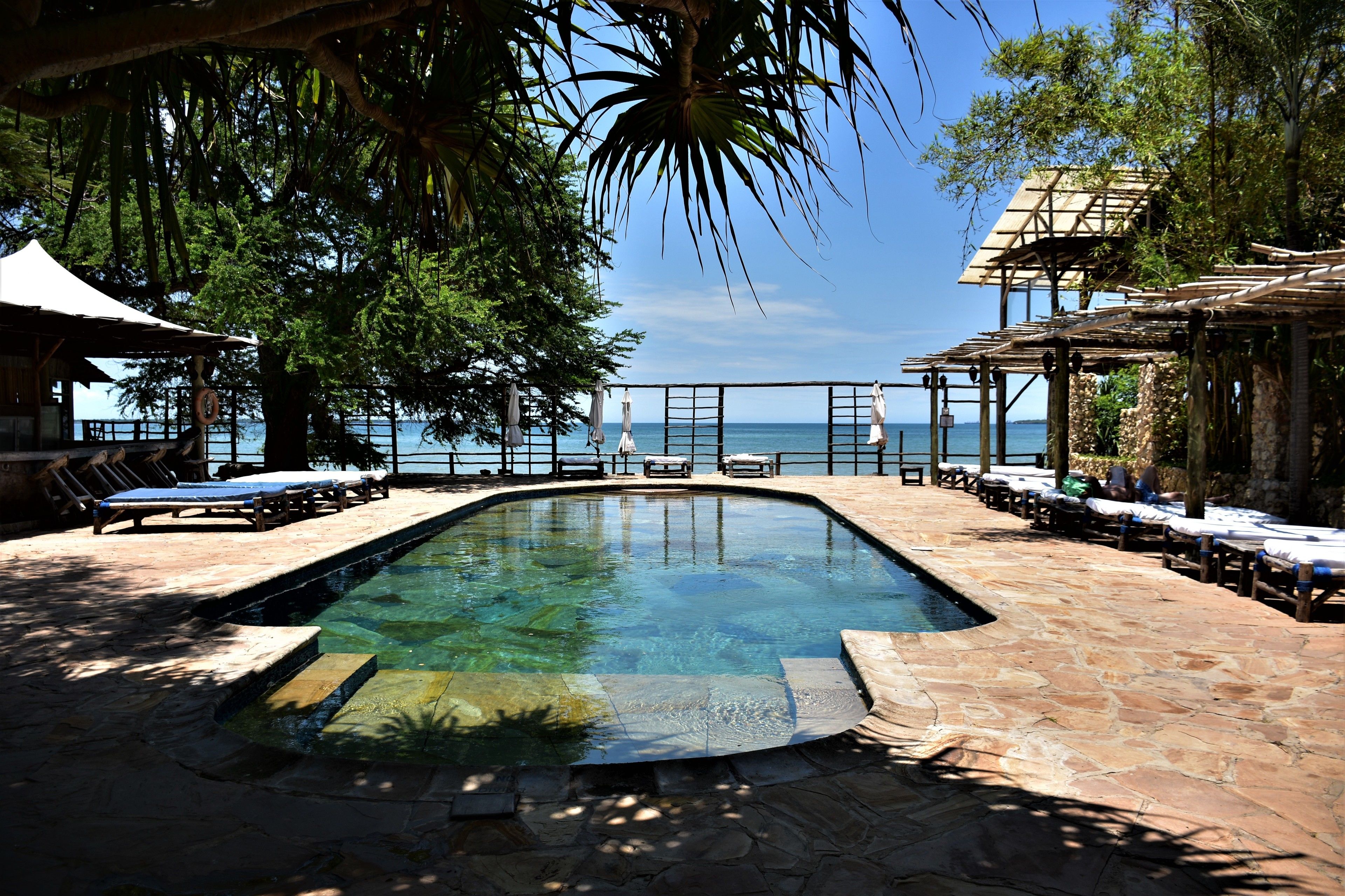 Outdoor pool, free cabanas, pool umbrellas