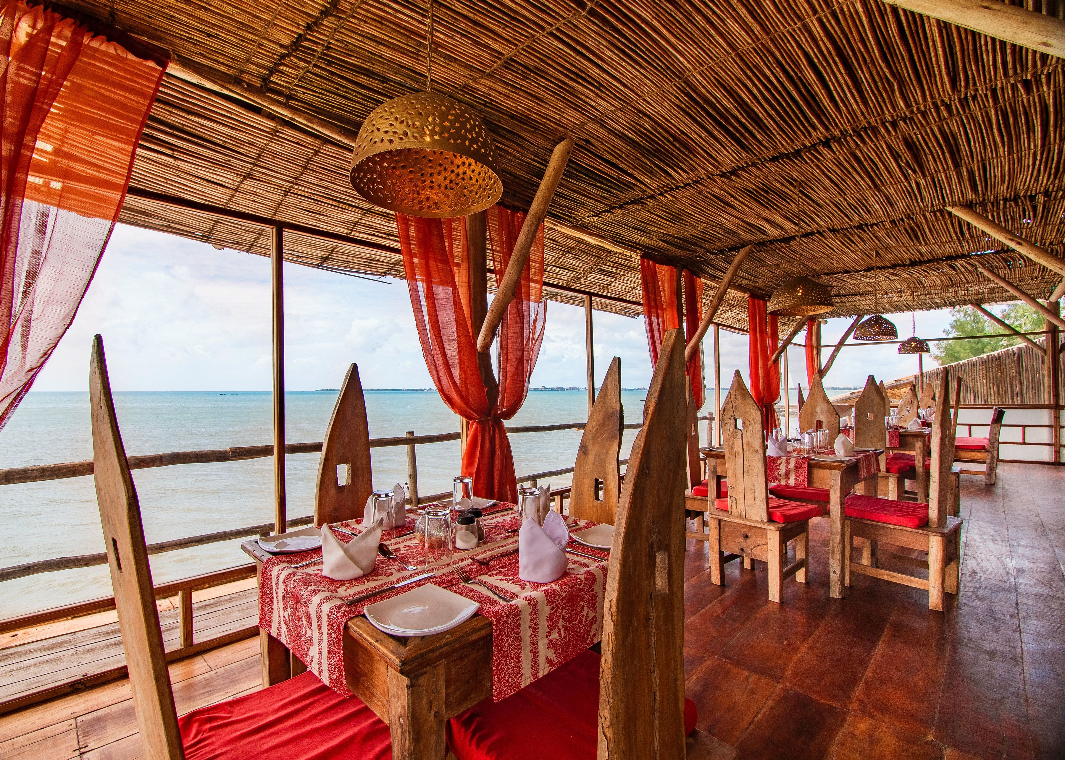 Breakfast, lunch, dinner served; Mediterranean cuisine, beach views 
