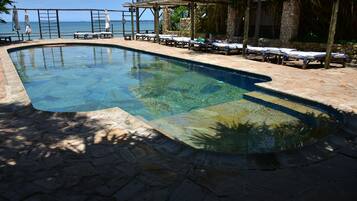 Outdoor pool, free pool cabanas, pool umbrellas