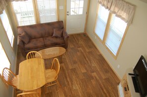 Family Cabin, 1 Bedroom (loft) | Living area | 18-inch flat-screen TV with cable channels, TV - Sun Outdoors San Antonio West (San Antonio)
