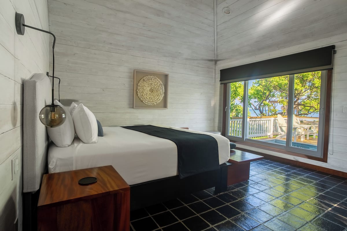 Deluxe Villa, Beach View | 1 bedroom, premium bedding, in-room safe, iron/ironing board