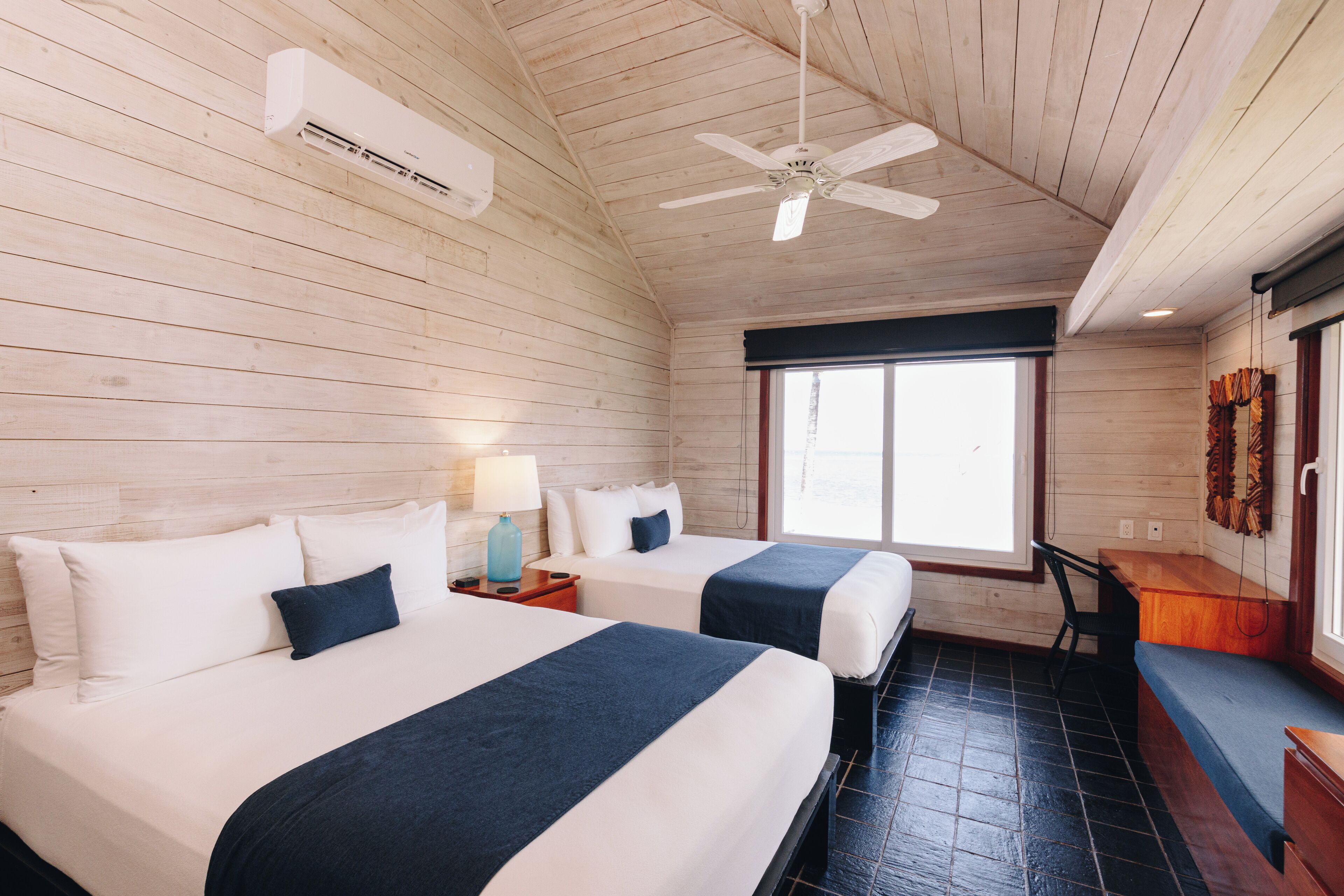 villa, 2 bedrooms, oceanfront | 1 bedroom, premium bedding, in-room safe, iron/ironing board