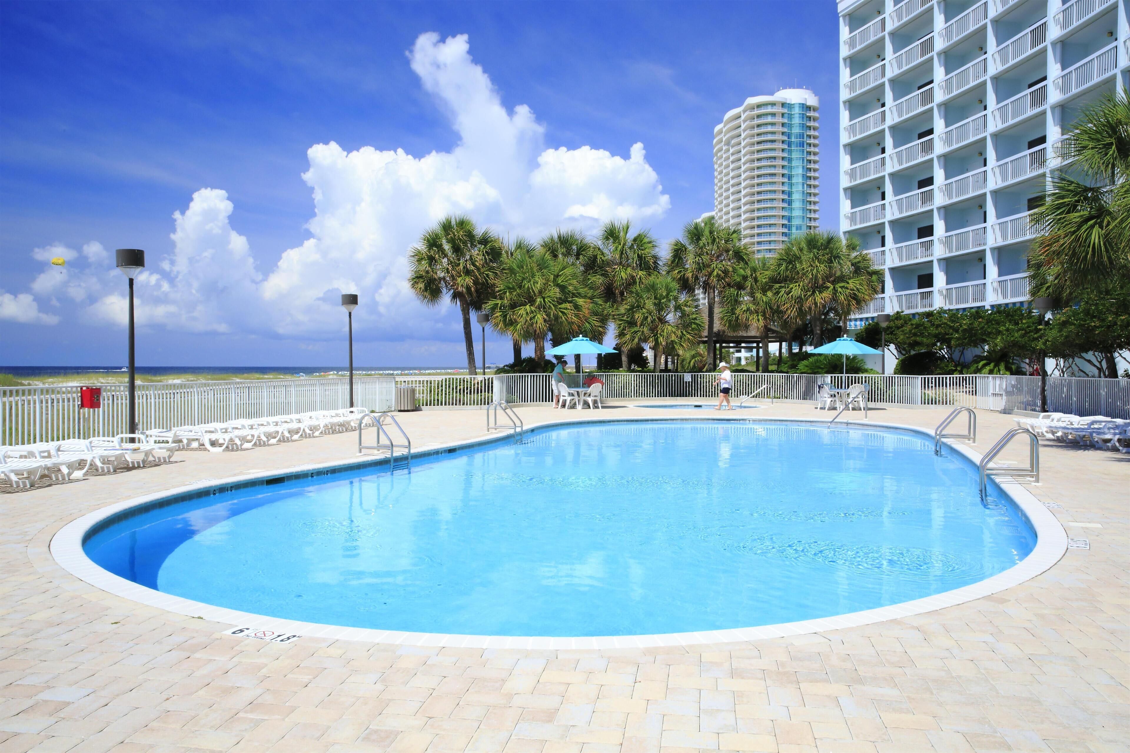 2 outdoor pools, a heated pool, open 8:00 AM to 10:00 PM, pool umbrellas