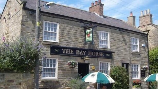 A stone building with a sign reading "The Bay Horse". - The Bay Horse Country Inn (Thirsk)