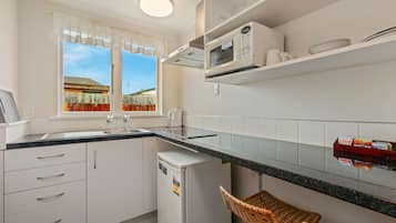 Classic Studio | Private kitchenette | Microwave, stovetop, coffee/tea maker, electric kettle