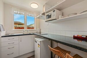 Classic Studio | Private kitchenette | Microwave, stovetop, coffee/tea maker, electric kettle