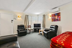 Large Two Bedroom Suite | Living area | 32-cm Smart TV with digital channels, TV, Netflix