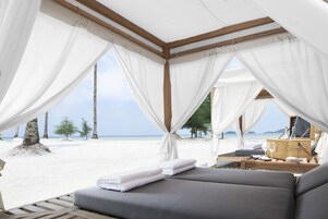 Private beach, white sand, free beach cabanas, sun loungers