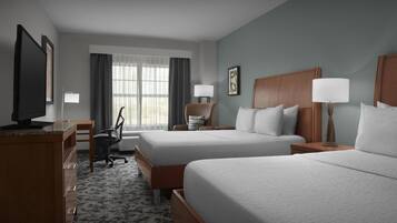 A hotel room with two beds, a desk, a chair, a TV, and a window with curtains.