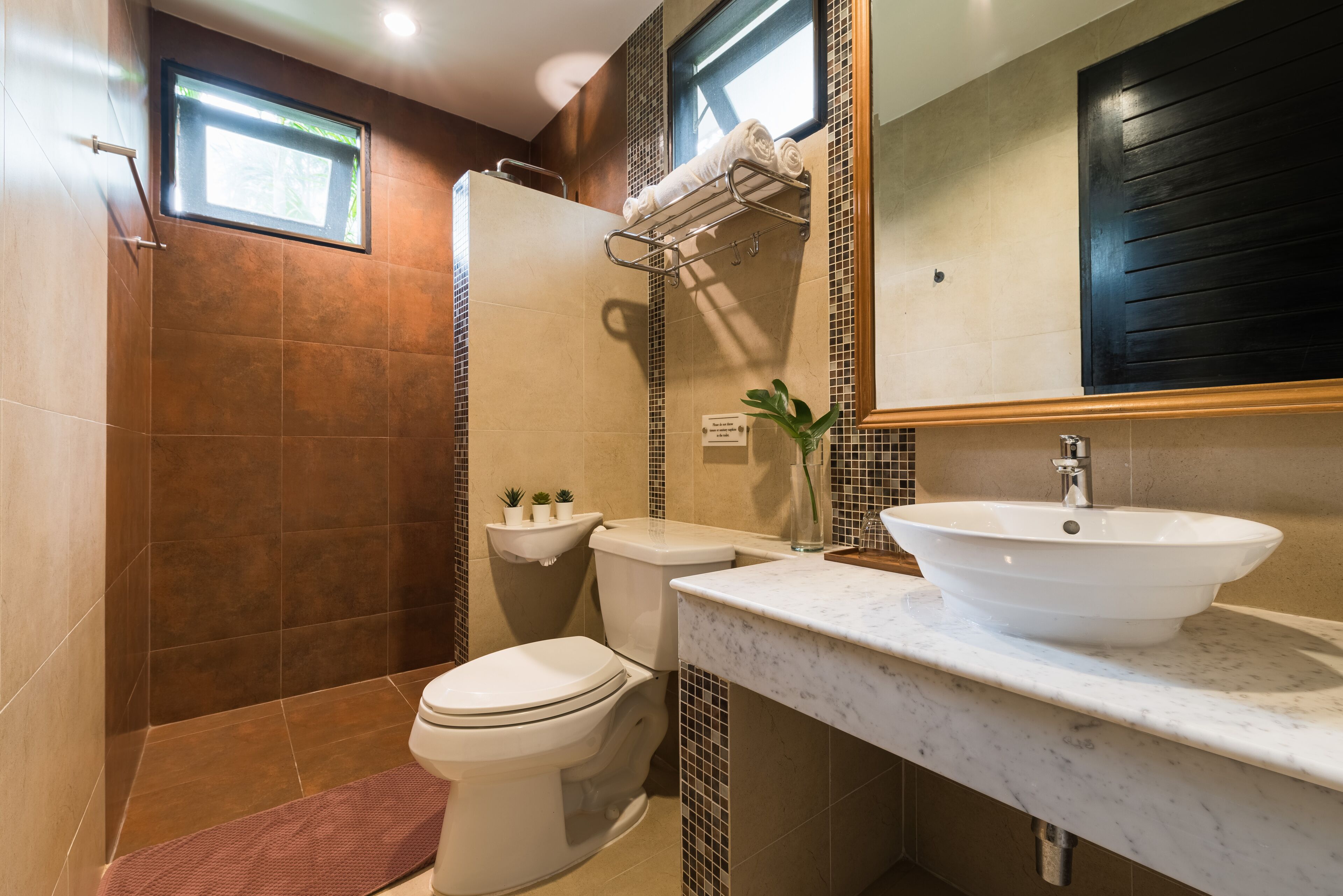 family villa | bathroom | shower, rainfall showerhead, free toiletries, hair dryer