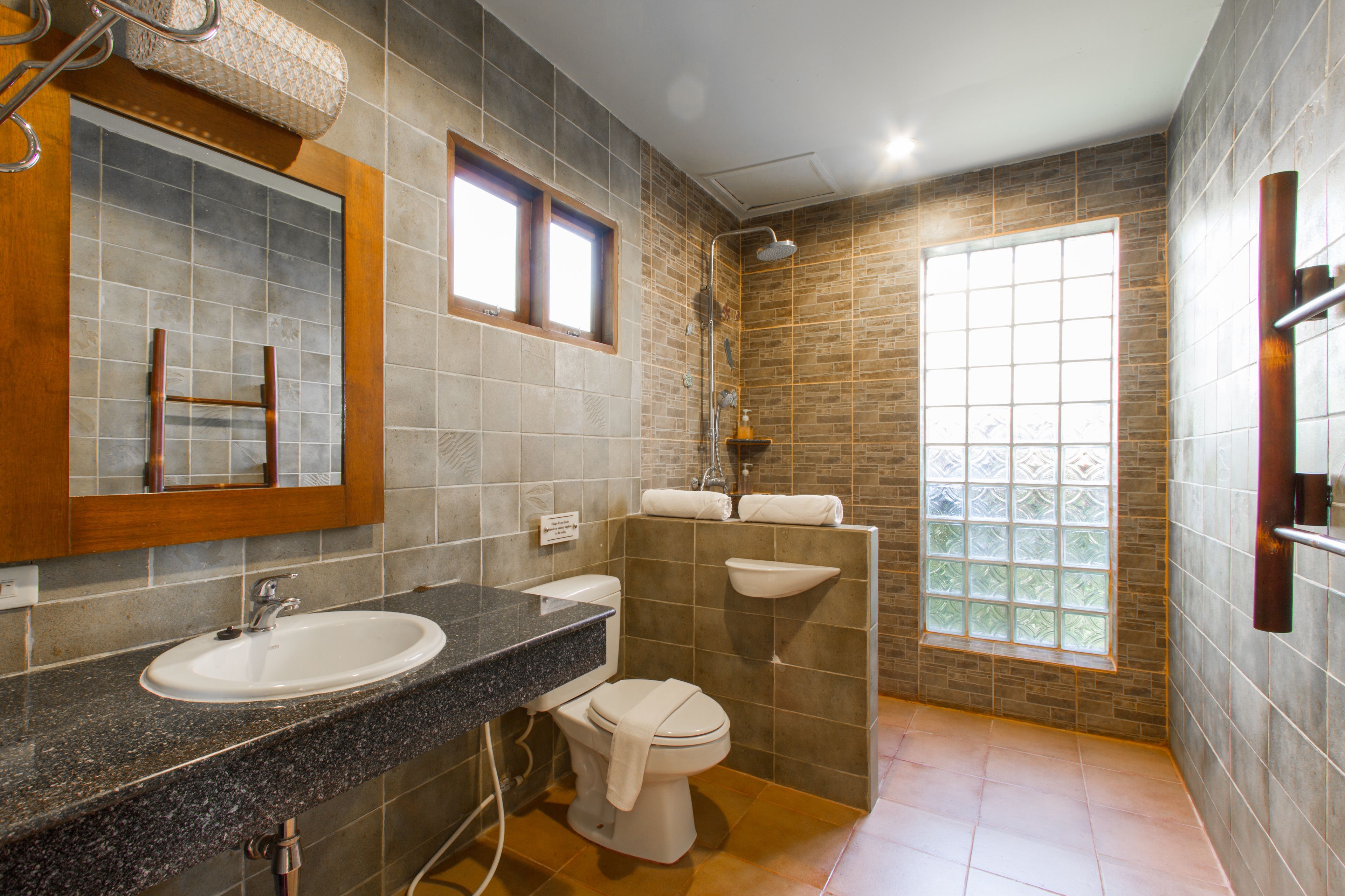 beachfront villa | bathroom | shower, rainfall showerhead, free toiletries, hair dryer