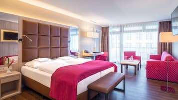 Minibar, coffres-forts dans les chambres, bureau, rideaux occultants