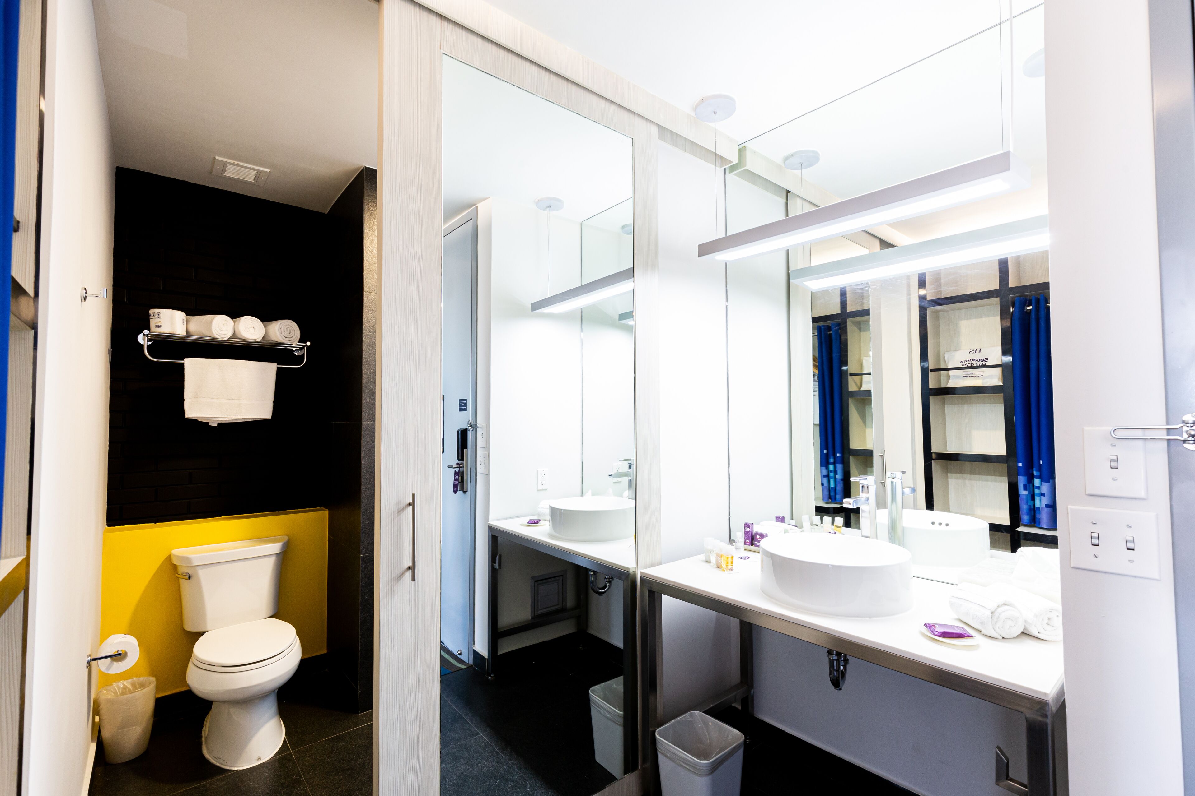 shower, rainfall showerhead, hair dryer, towels