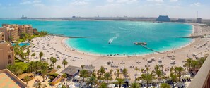 Private beach, white sand, free beach cabanas, sun loungers
