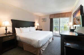 Room, 1 King Bed, Balcony | Desk, laptop workspace, blackout drapes, iron/ironing board