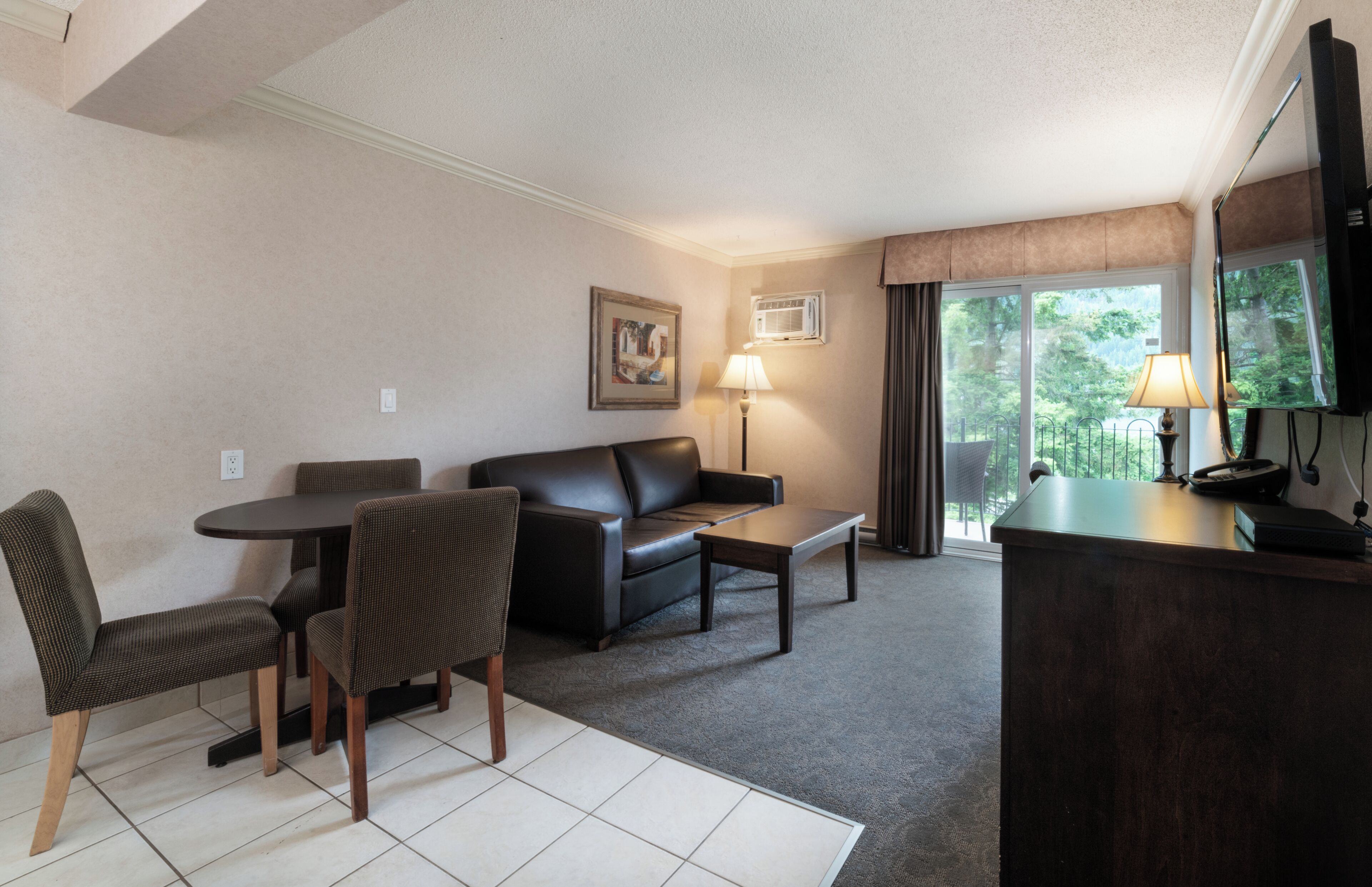 Executive Suite, 2 Queen Beds, Balcony | Living area | 42-inch plasma TV with cable channels, TV
