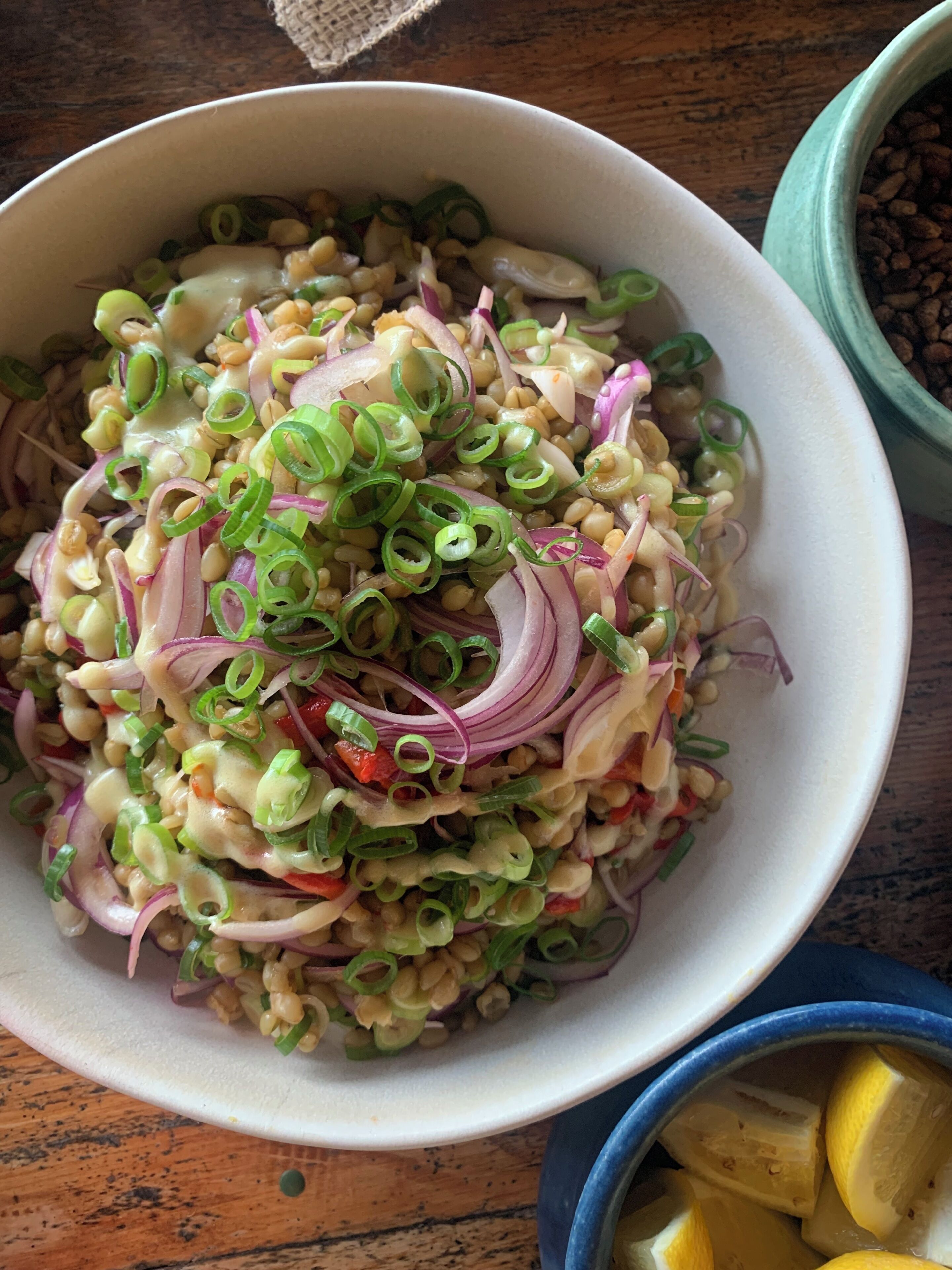 A bowl of salad with various ingredients.
