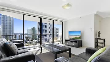 55-inch flat-screen TV with cable channels, TV, DVD player