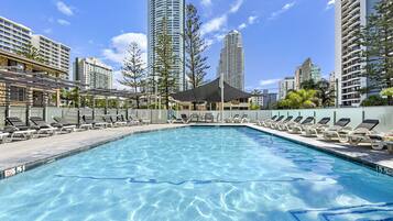 Outdoor pool, a heated pool, open 7:30 AM to 9:30 PM, pool loungers