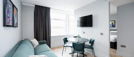 Apartment, 1 Bedroom | Laptop workspace, blackout drapes, soundproofing, iron/ironing board