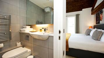 Shower, free toiletries, hair dryer, towels