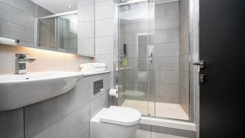 Shower, free toiletries, hair dryer, towels