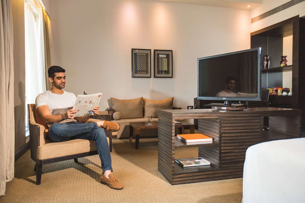 suite (hyatt) | living room | 37-inch led tv with satellite channels, tv, ipod dock