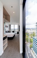Deluxe Room, 1 Queen Bed, Corner | In-room safe, desk, iron/ironing board, free WiFi