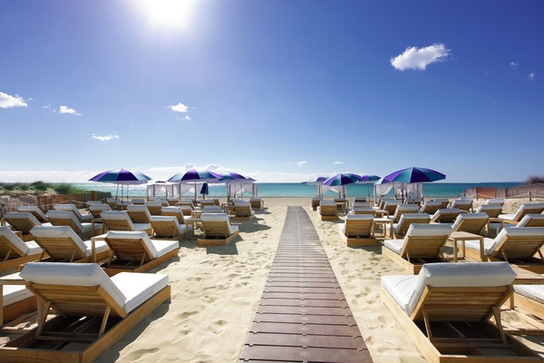 On the beach, sun loungers, beach umbrellas, beach bar