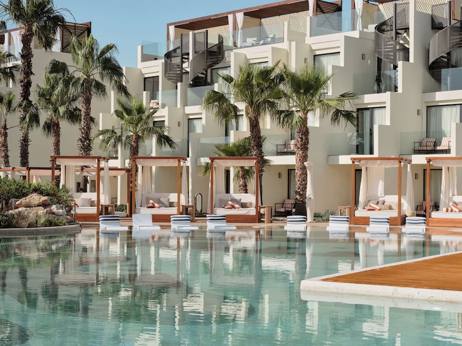 3 outdoor pools, open 10:00 AM to 7:00 PM, pool umbrellas, pool loungers
